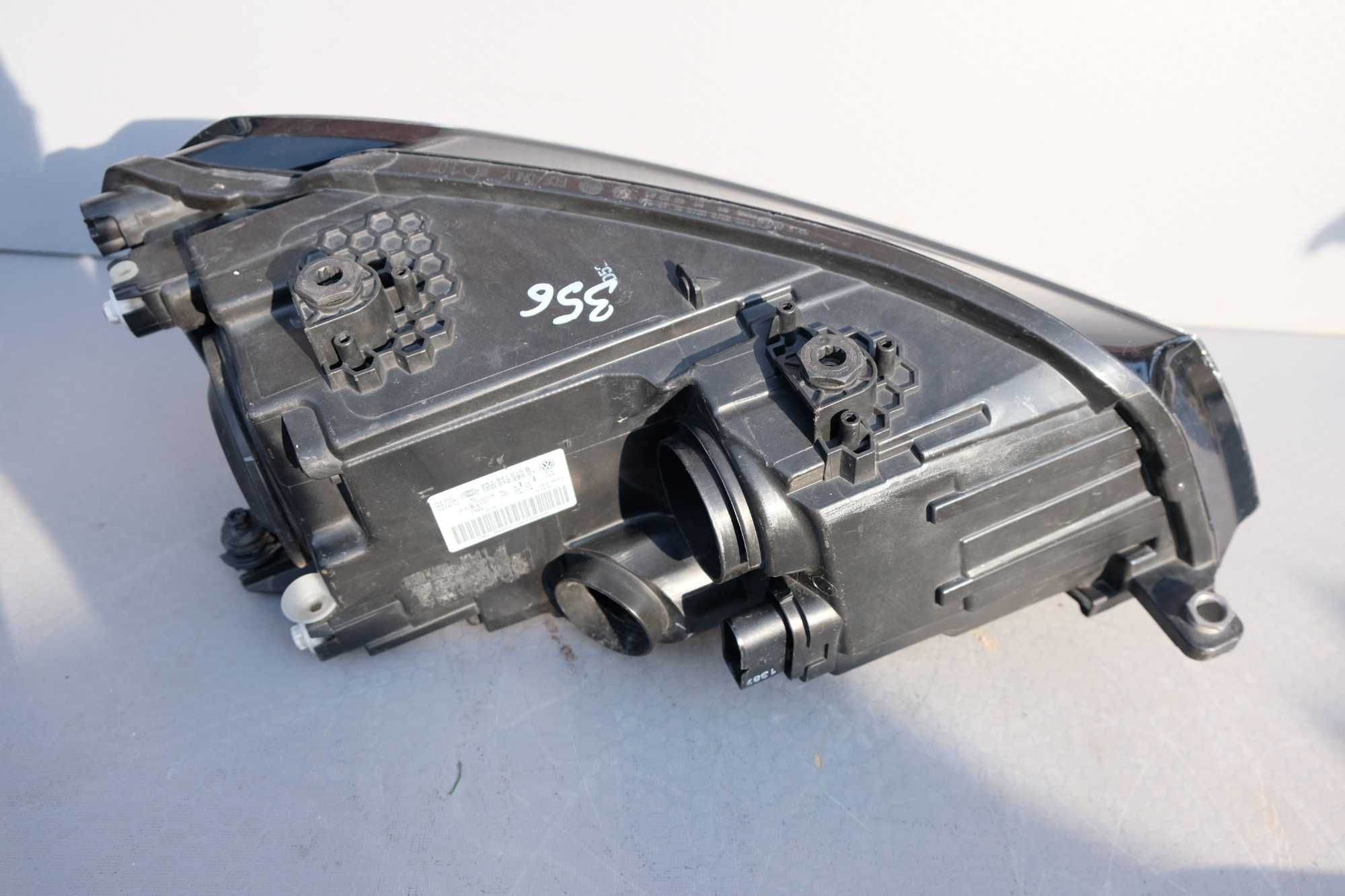 Lampa lewy przód Vw Caddy III llift 2k1