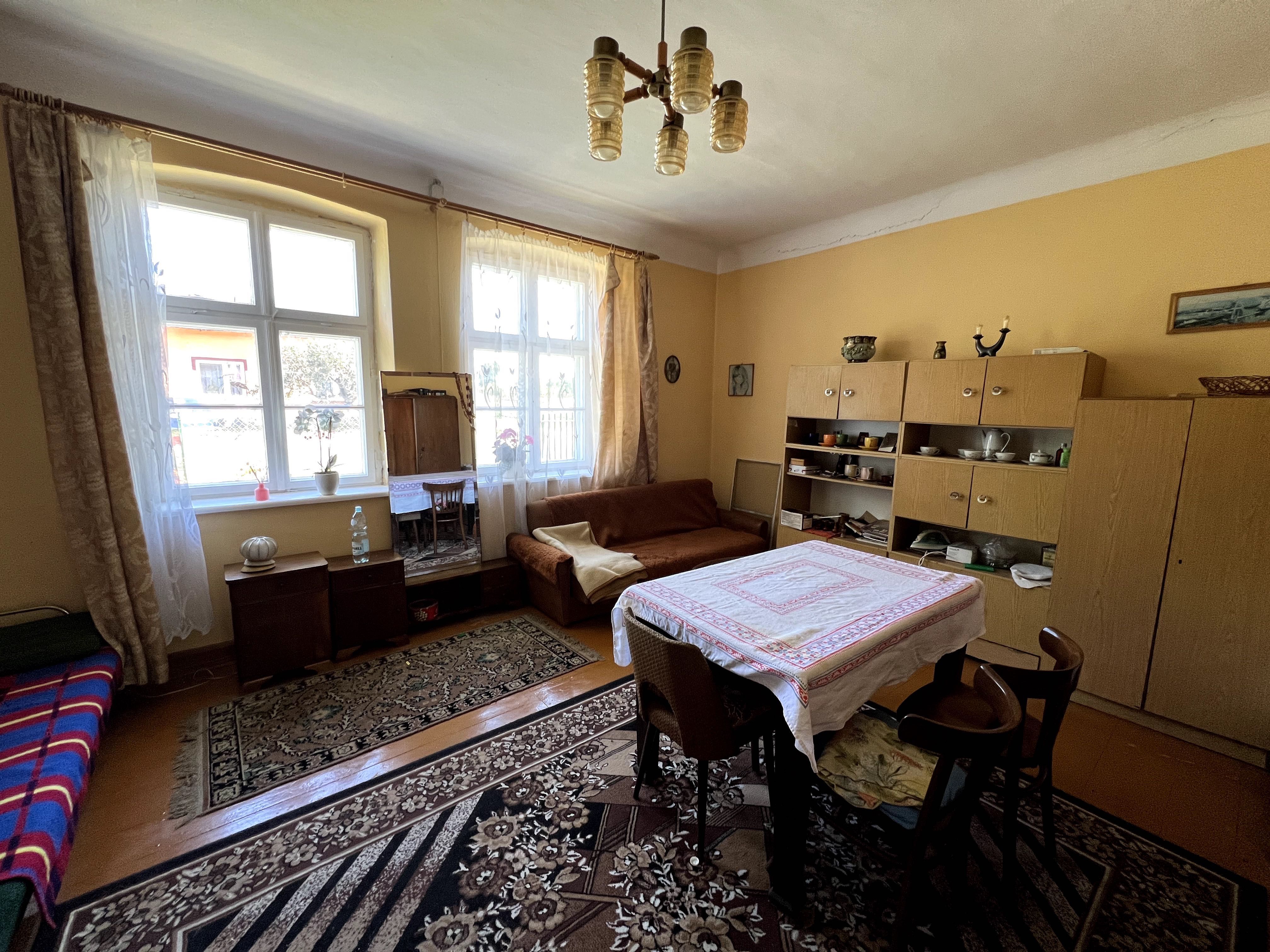 Dom 74 m² z budynkiem gosp. i ogrodem