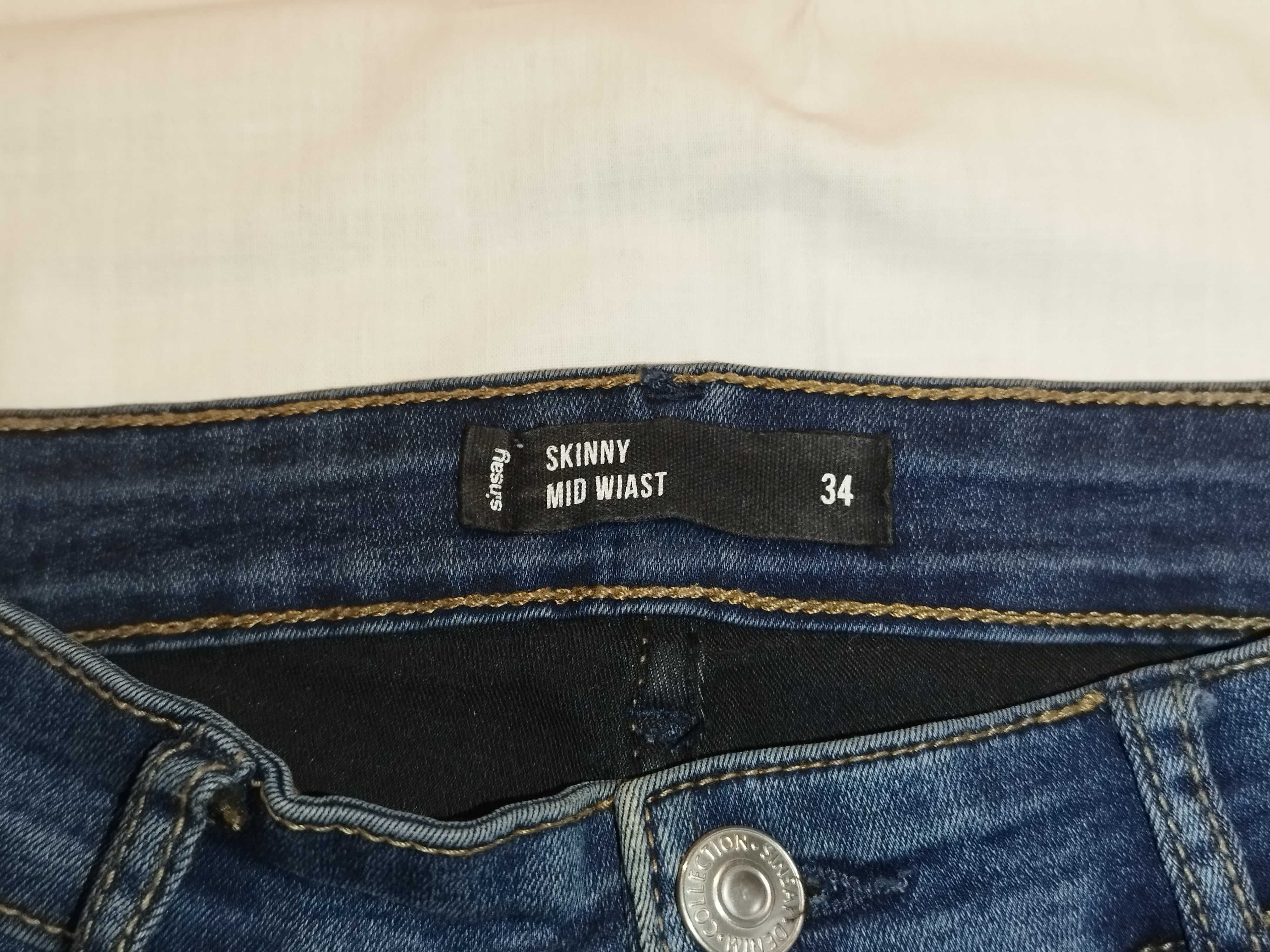 skinny jeans mid waist 34