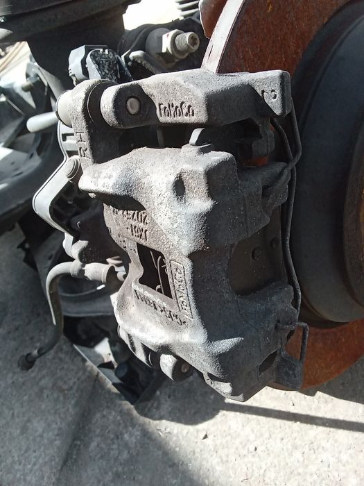 Zacisk hamulcowy tył Ford Focus MK4 Kombi