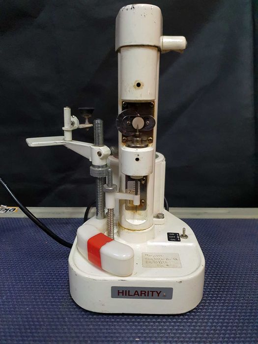 Máquina vintge de perfuração e entalhe de lentes