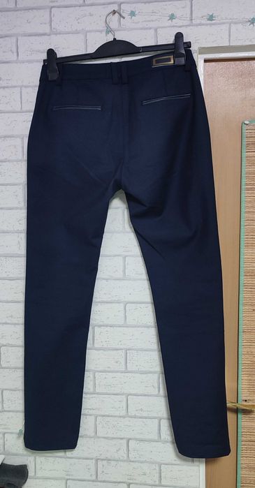 Granatowe spodnie damskie cygaretki Nice Toxic 1 rozm L 40