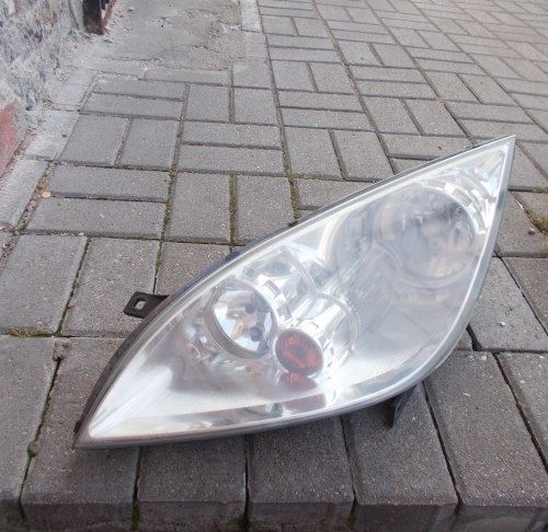 MITSUBISHI COLT VI Z30 04- LEWA PRZEDNIA LAMPA ORYGINAŁ