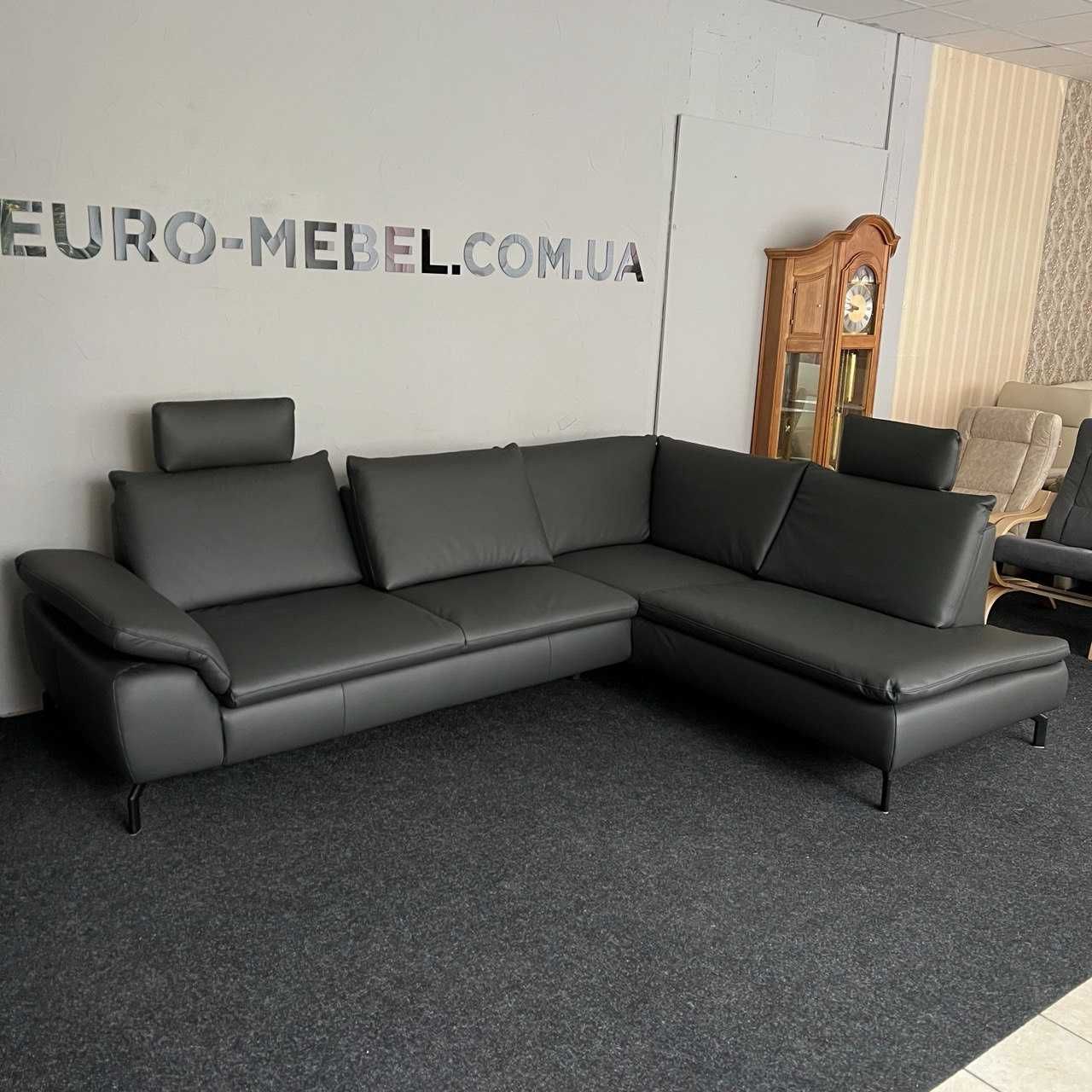 Шкіряний кутовий новий диван з пуфом Німеччина
