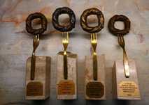 4x Nagroda Laureat Krakowskich Restauracji Złoty widelec obwarzanek