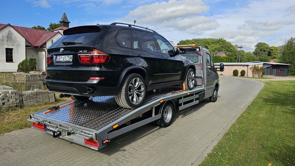 POMOC DROGOWA 24/7 Autolaweta Transport
