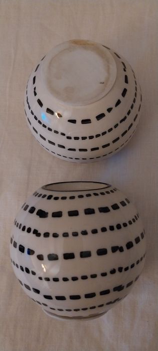 2 castiçais em louça