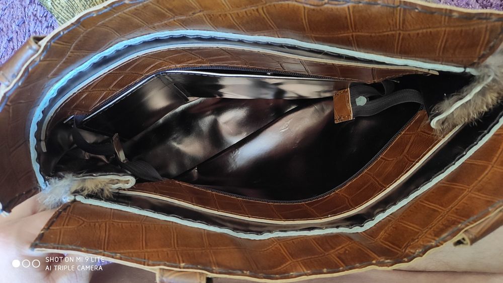 Mala/carteira em pele