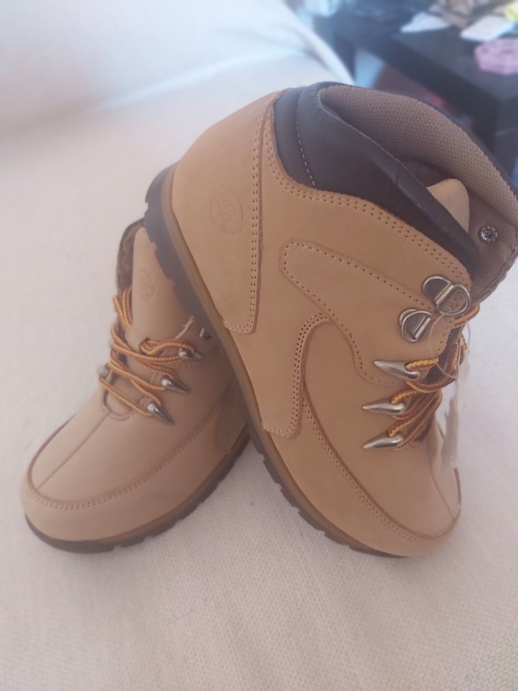 Botas camel n⁰33 em pele