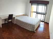 Quartos em Apartamento