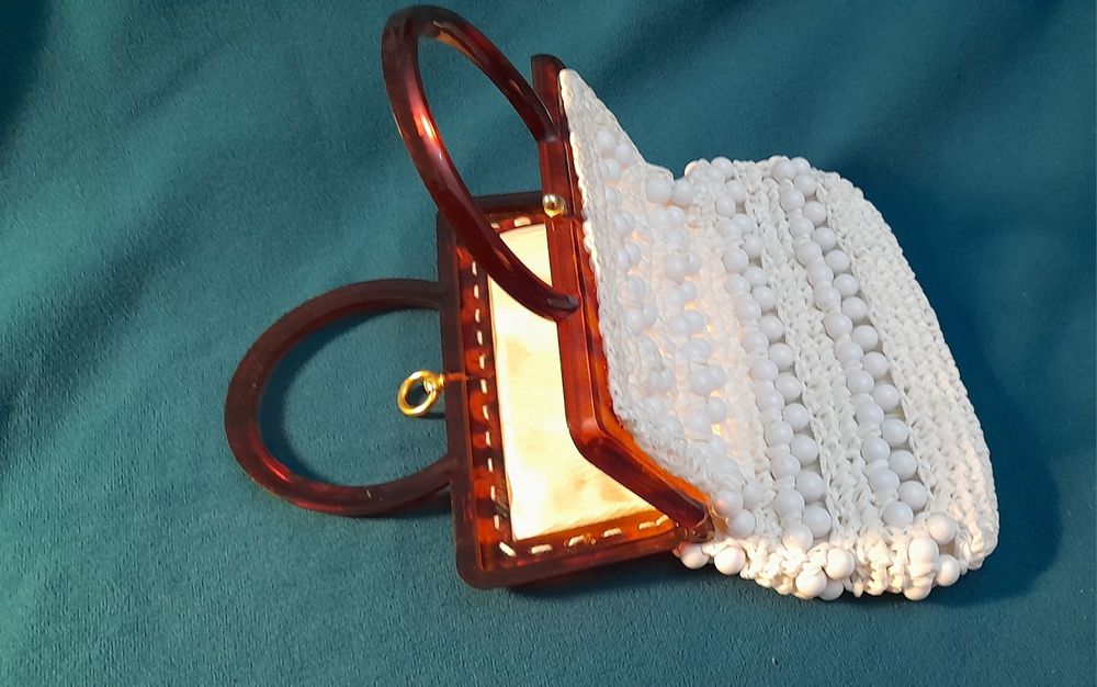 Pochete feminina anos 60