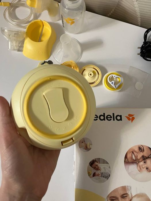 Молокоотсос Medela Sving