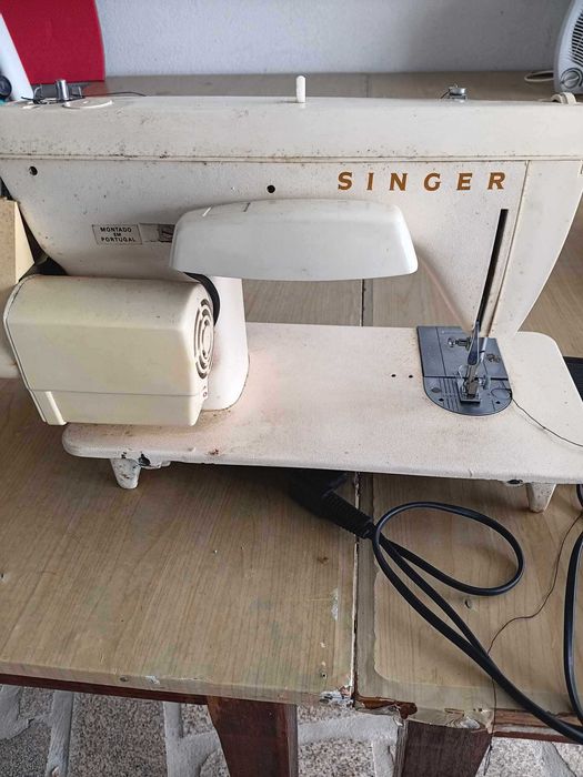 Máquina de costura singer