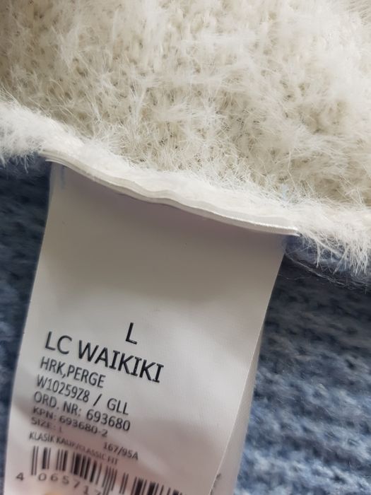 Голубой кардиган с меховыми рукавами