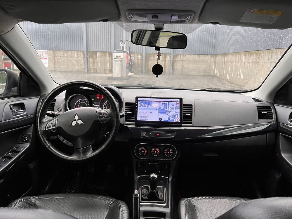 Mitsubishi Lancer 2012 • 1.6 МКПП ГАЗ/БЕНЗИН