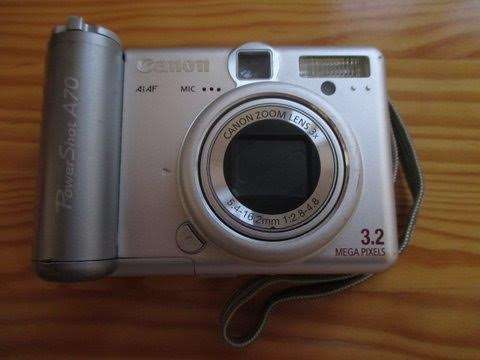 Canon PowerShot A70 3.2 Meg Pix+Câmera DigitalSamsung Digimax 202 2.0