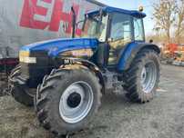 New Holland M100  pneumatyka, zaczep transportowy, klimatyzacja