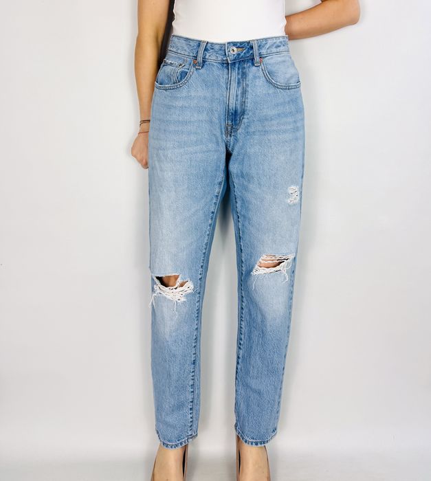Jasnoniebieskie jeansy z przetarciami S 36