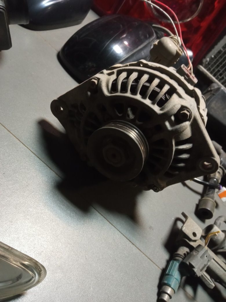 Mazda Premacy 1.8 alternator chłodnica lampy cewka roleta kierunki