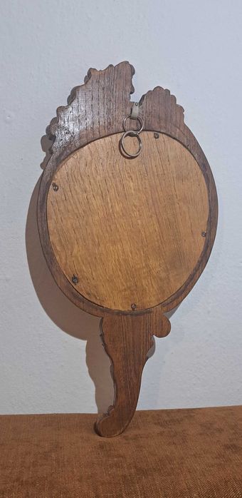 zabytkowe lustro w drewnianej rzeźbionej ramie