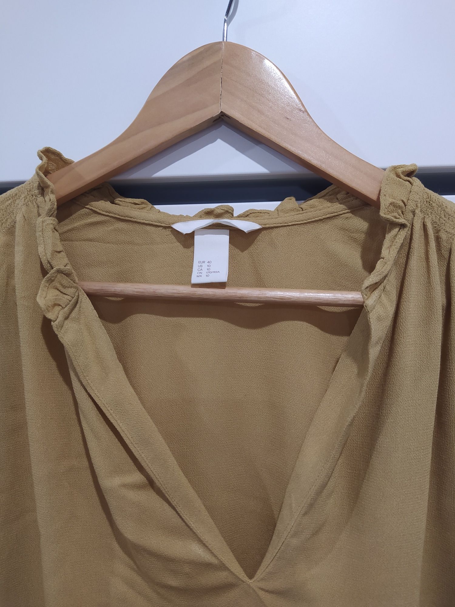 Elegancka musztardowa bluzka H&M