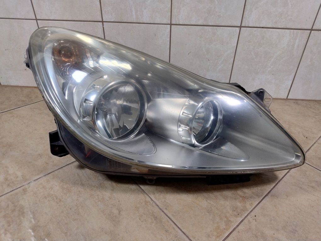 Lampa reflektor prawy przód Opel Corsa D  europa Tyc wysyłka