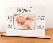 Moldura com característica do bebé personalizada