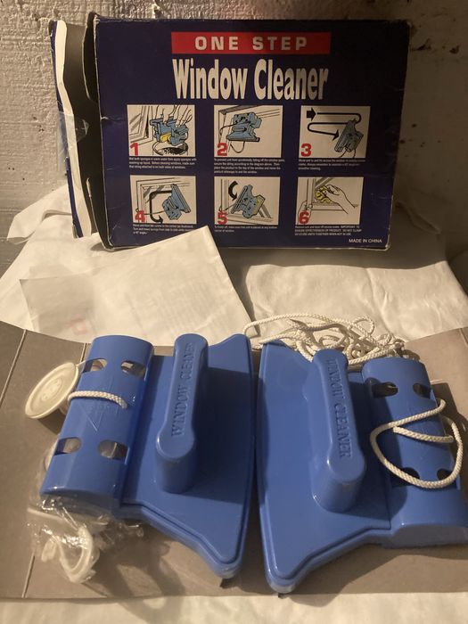 Lavar janelas com iman