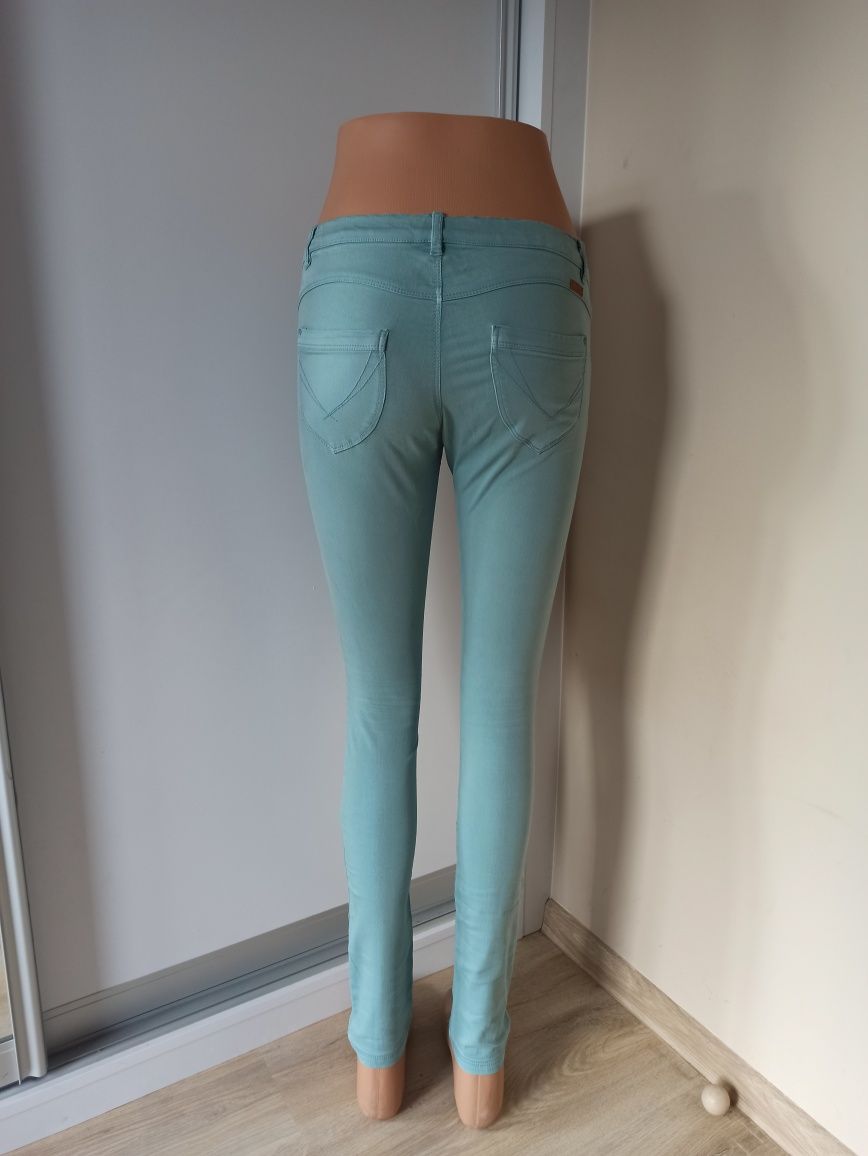 Turkusowe spodnie jeansowe rozm. S