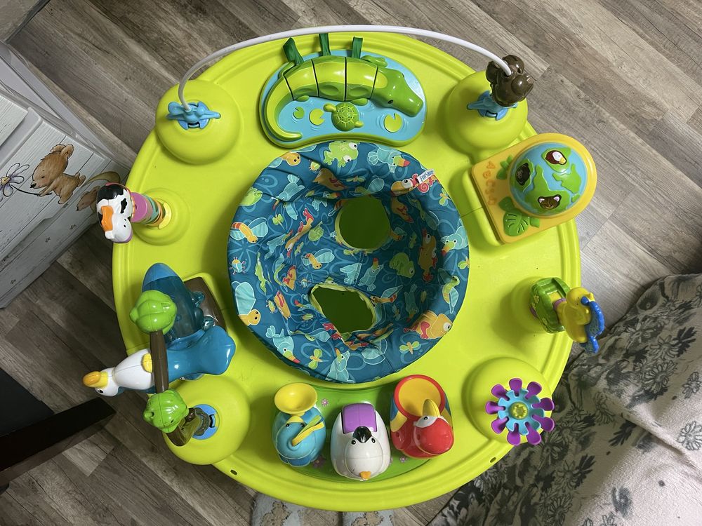 Продам центр-пригунець для дітей розвиваючий центр ExerSaucer Triple