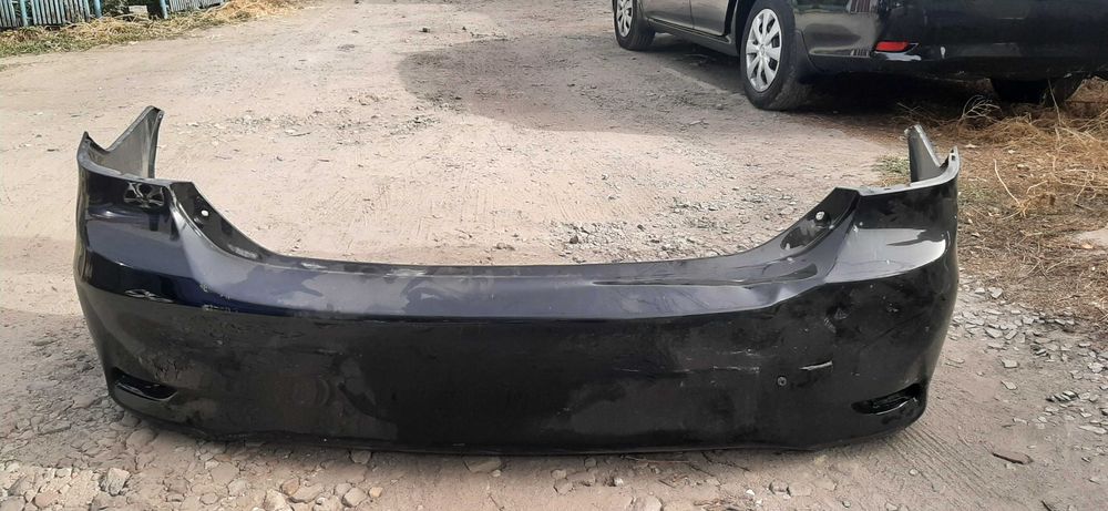 Бампер задній TOYOTA Corolla E150 2011 (під пайку).