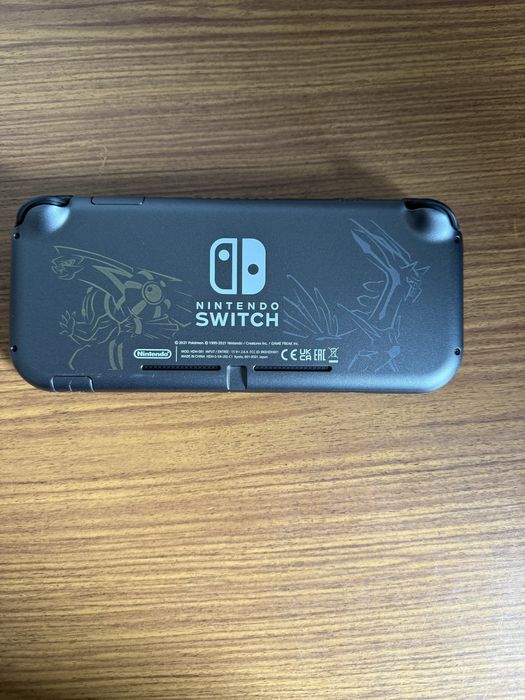 Nintendo Switch Lite + Jogos e Acessórios (como nova)