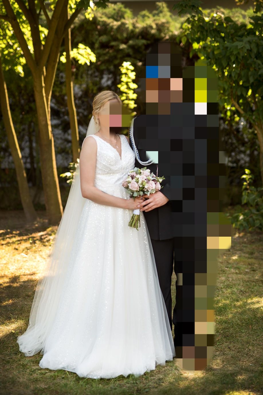 Suknia ślubna plus dwa welony
