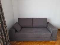 Sofa dwuosobowa rozkładana PMW model Dax, ciemnoszara, stan bdb