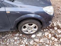 Błotnik prawy lewy opel astra h z168