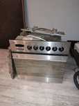 Kuchenka z piekarnikiem Amica srebrna model GH0100