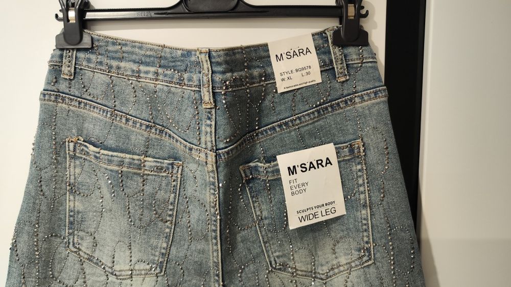 Szerokie spodnie szwedy z cekinami M. Sara