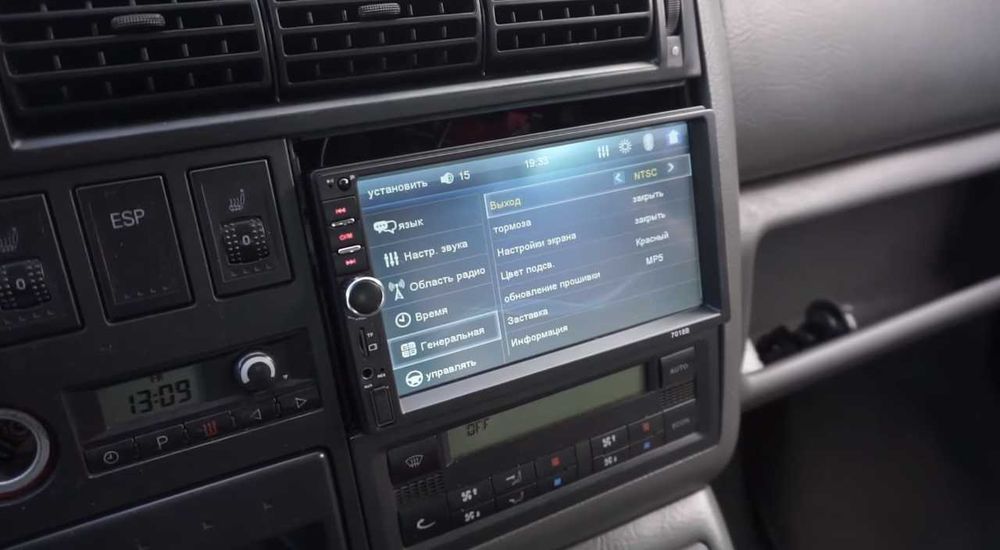 Универсальная 7018b 2din магнитола сенсорное управление з рамкой