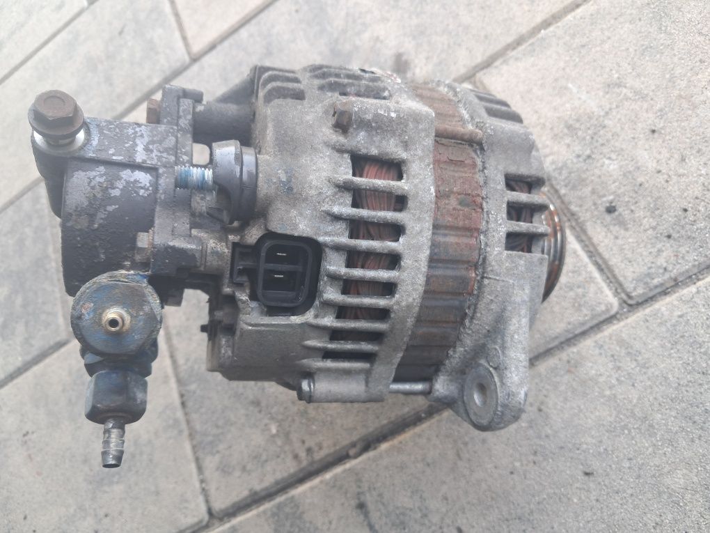 Alternator z Vacum pompą Opel Corsa C Diesel 1.7 DTI Rok 2003