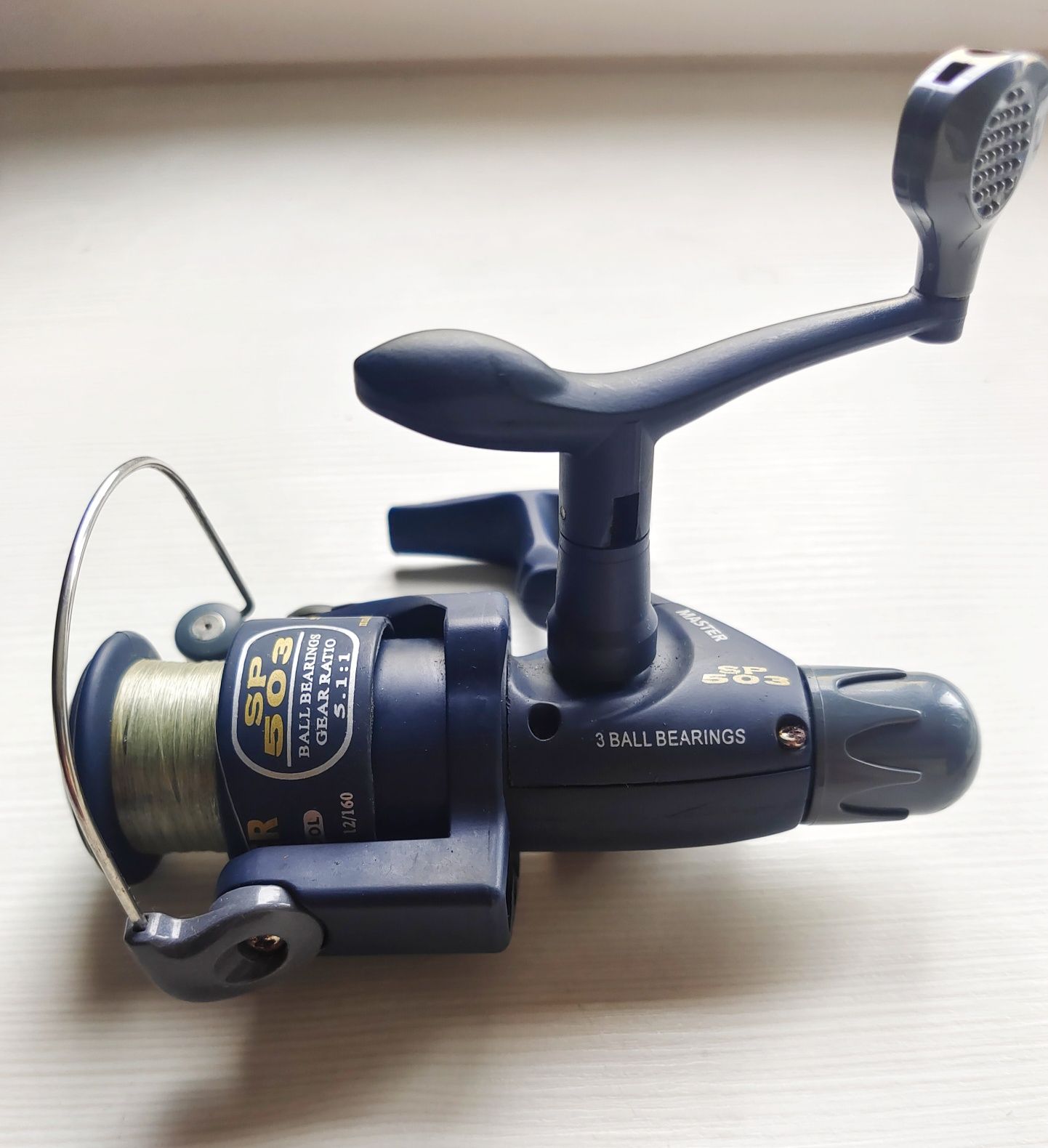 Kołowrotek wędkarski Master Sp 503 + spławik
