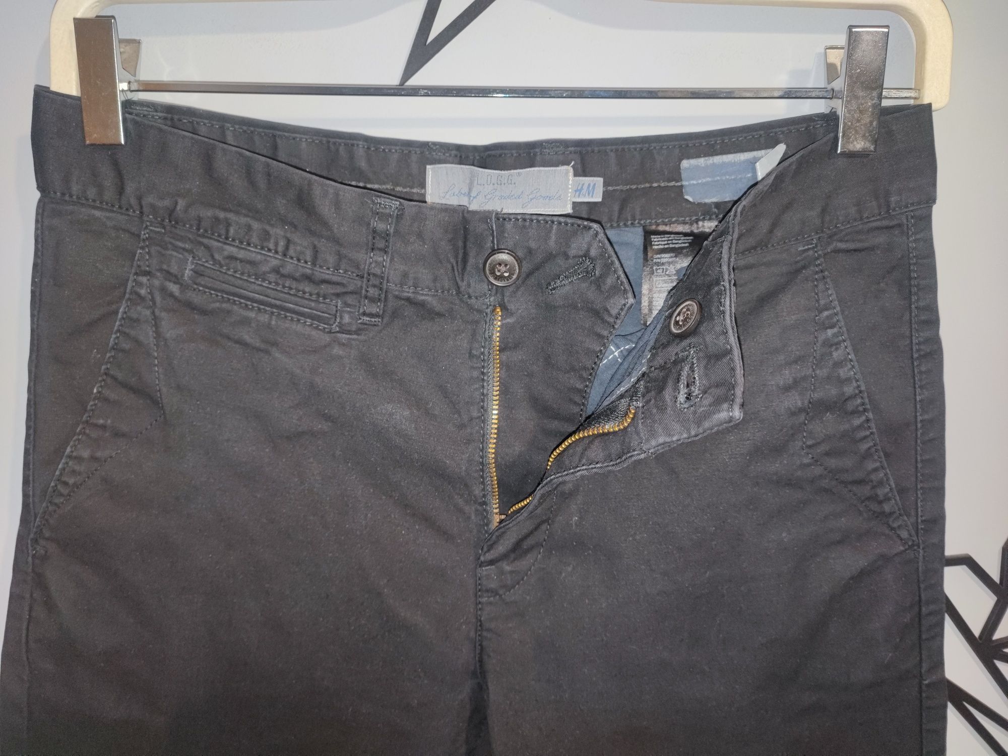 Czarne spodnie jeansy męskie H&M 29