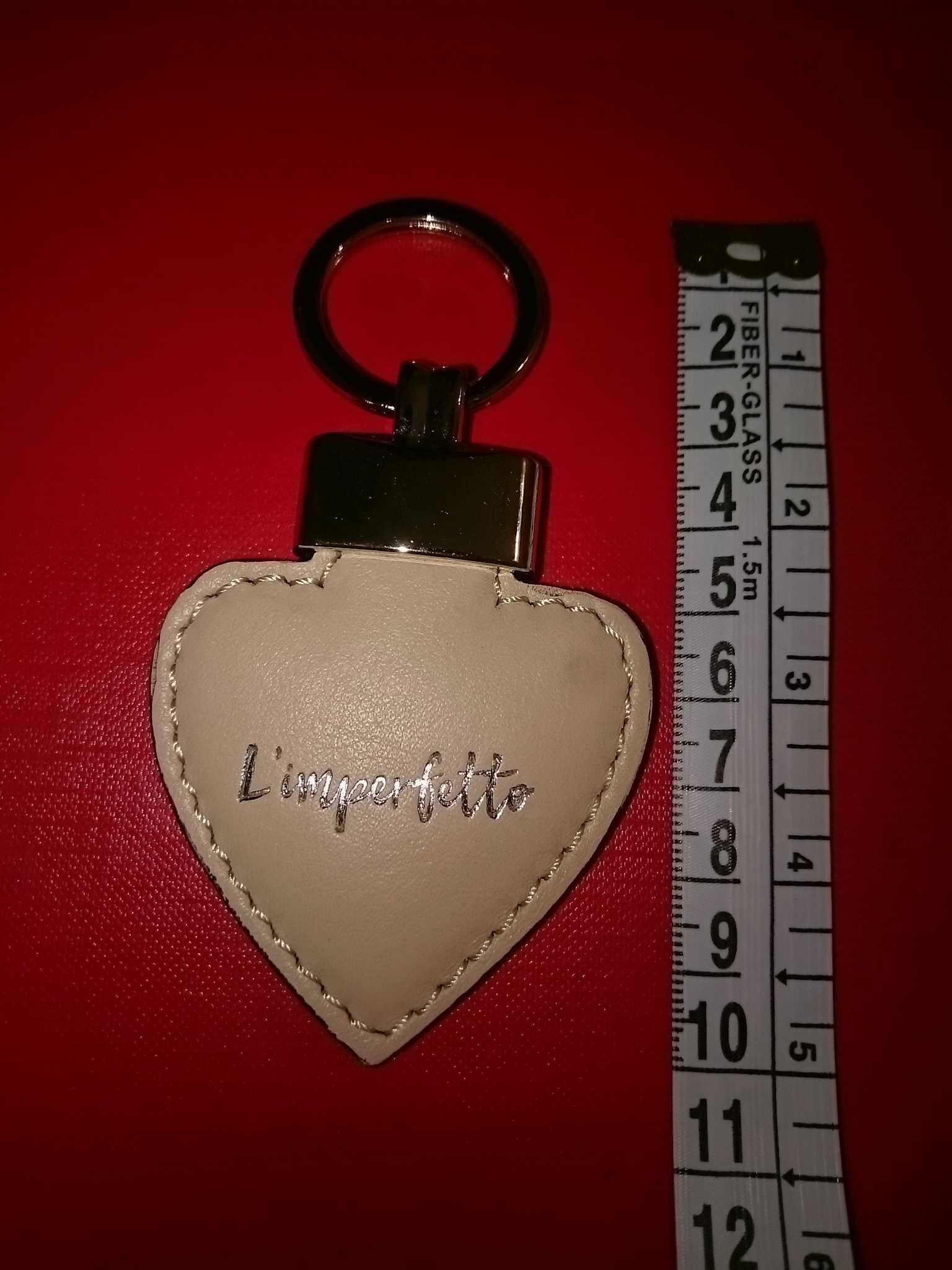 Стильный подарок - сердечко. 9,5 см. Кожа + сталь.