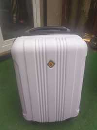 Mała walizka kabinowa biało - czarna na 4 kółkach 360 stopni, z tworzy