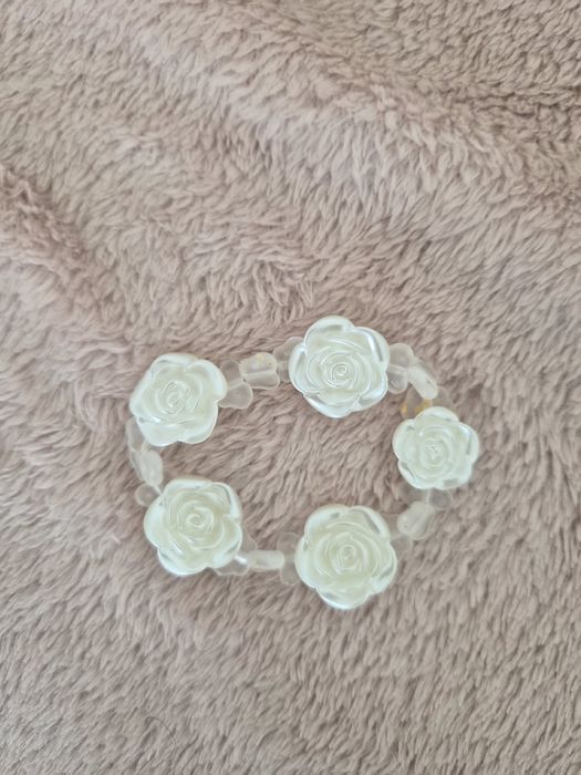 Pulseira elástica com flores