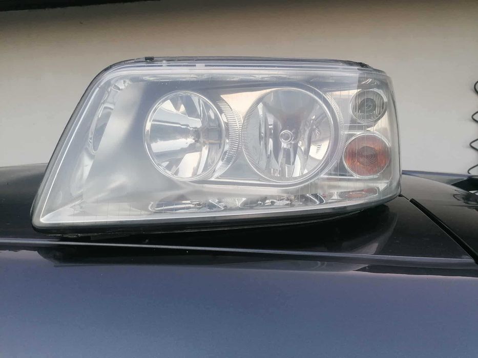 VW T5 MULTIVAN lampa lewy przód