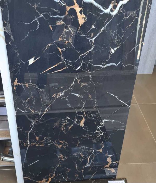 cerâmico imitação mármore 120x60  preto com dourados
