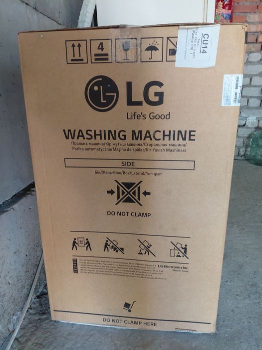 Стиральная машина в упаковке LG