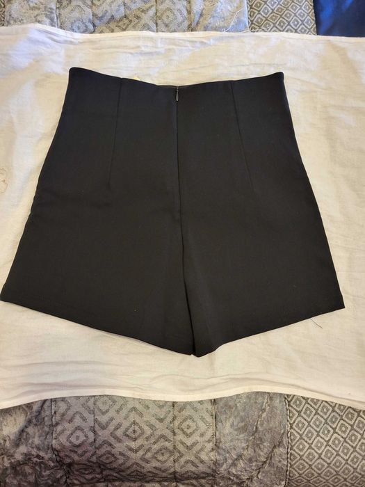 Saias calções pretas novas