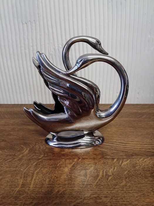 Serwetnik metalowy srebrny łabędzie