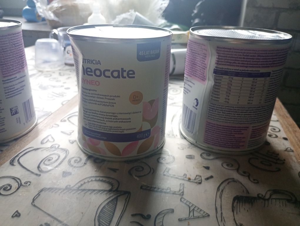 Mleko neocate syneo 5 puszek ,dwie pogniecione w transporcie